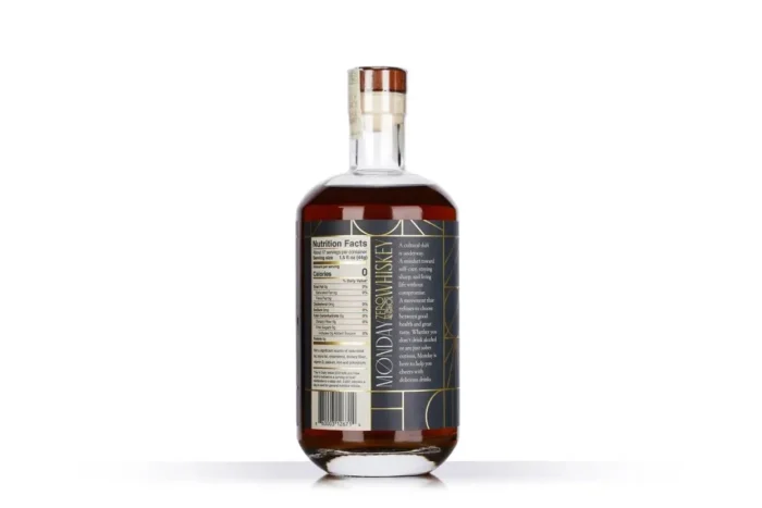 Back label of Monday Zero Alcohol Whiskey showing nutrition facts and product details.