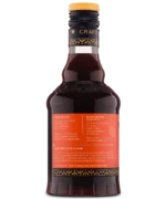 Glass bottle with red label and dark liquid, perfect for gourmet cooking or specialty beverages.