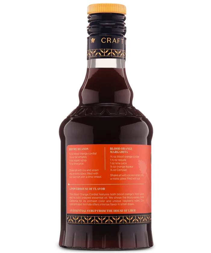 Glass bottle with red label and dark liquid, perfect for gourmet cooking or specialty beverages.