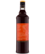 Side view of a glass bottle with a red label and dark liquid, perfect for blood orange beverages.