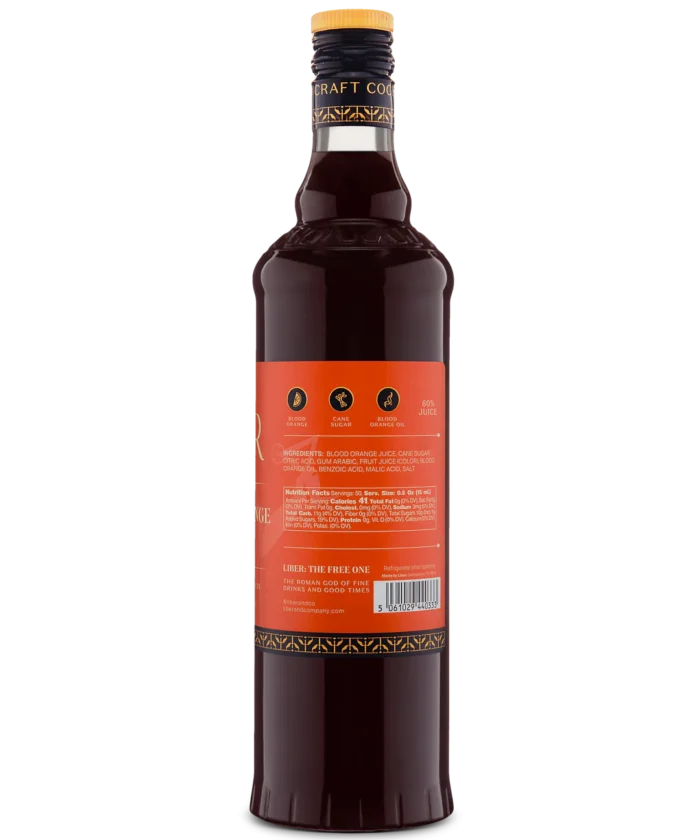 Back view of a tall glass bottle with a red label and dark liquid, ideal for gourmet drinks or cocktails.