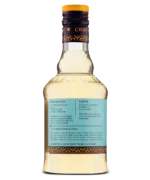Close-up of liquor bottle's rear label displaying product information.