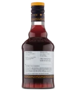 Close-up of red liquor bottle's back label featuring detailed text on a white background.