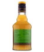 Glass bottle with green label and yellow liquid, perfect for beverages or culinary use.