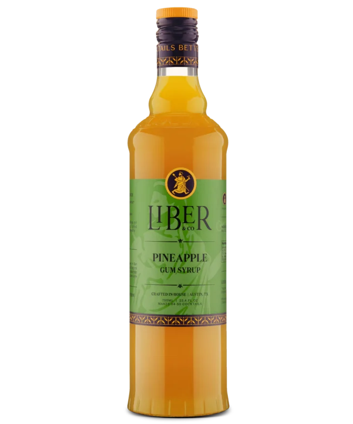 Glass bottle with green Liber label and yellow liquid, featuring pineapple flavor for beverages.