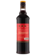Rear view of a dark liquor bottle with detailed product information on a red label.