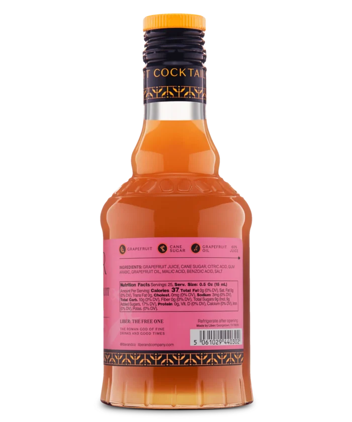 Close-up of an orange liquor bottle's back label featuring detailed text on a pink background.