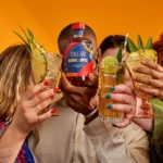 Caleño Dark & Spicy: A vibrant non-alcoholic spirit, perfect for social gatherings, full of tropical flavor.