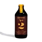Curious Elixirs No. 2 bottle featuring a handcrafted booze-free cocktail with ginger and lime flavors.
