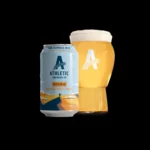 Athletic Brewing Co. Wit's Peak Belgian-Style White can and poured beer with a frothy head on black background.
