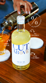 Cut Above Mezcal bottle image showcasing product features like 'Zero Sugar,' 'No Alcohol,' and 'Low Calories.